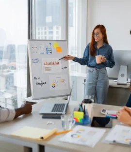 A team of digital advertising firm professionals collaborating on a marketing campaign strategy